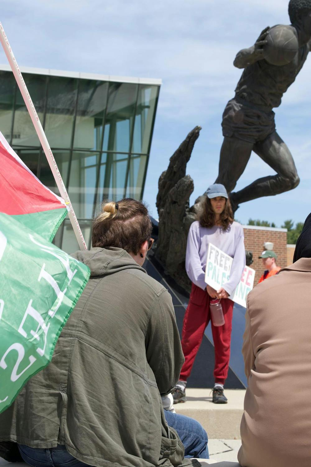 Students picket outside of the Breslin Center on April 26, 2024. They called on MSU to divest from Israel and held a teach-in. 