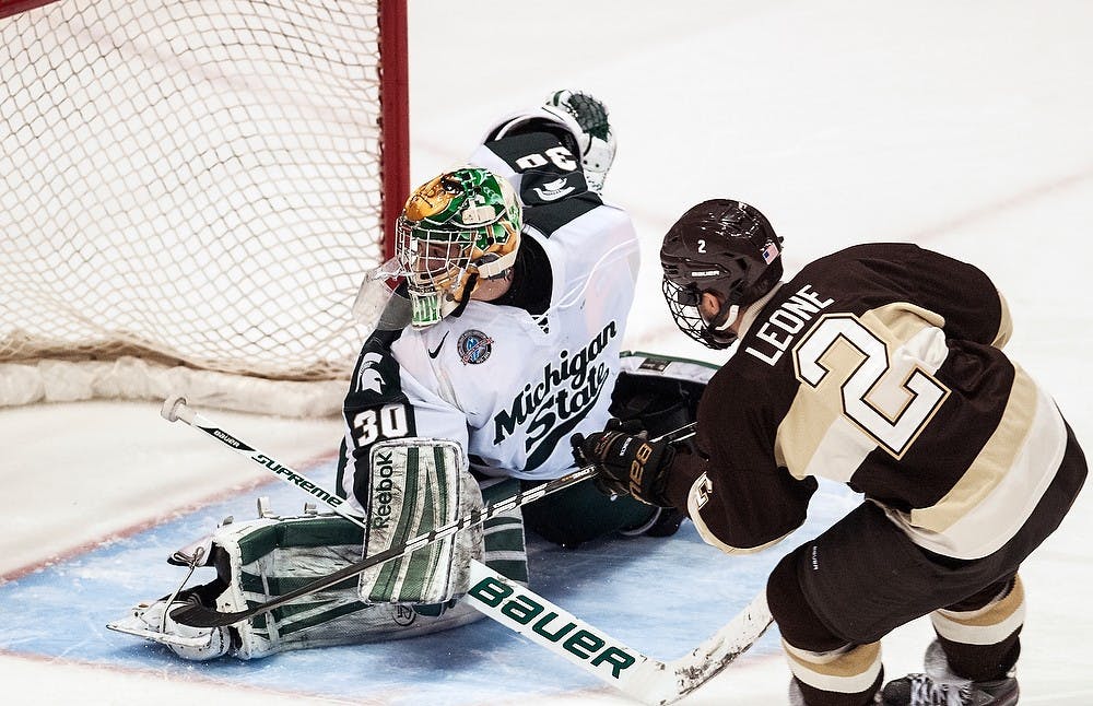 	<p>Freshman goaltender Jake Hildebrand watches as the puck is shot past him to end the game during the shootout period Saturday, Dec. 29, 2012, at Joe Louis Arena in Detroit. Western Michigan defeated the Spartans 2-1 with an overtime victory during the first game of the Great Lakes Invitational. Adam Toolin/The State News</p>