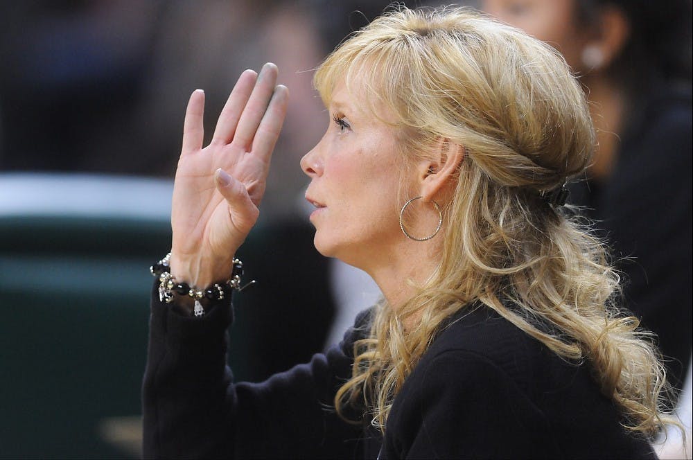 <p>Head coach Suzy Merchant calls a play Feb 5, 2015, during the game against Michigan at Breslin Center. The Spartans were defeated by the Wolverines, 72-59. Kennedy Thatch/The State News</p>