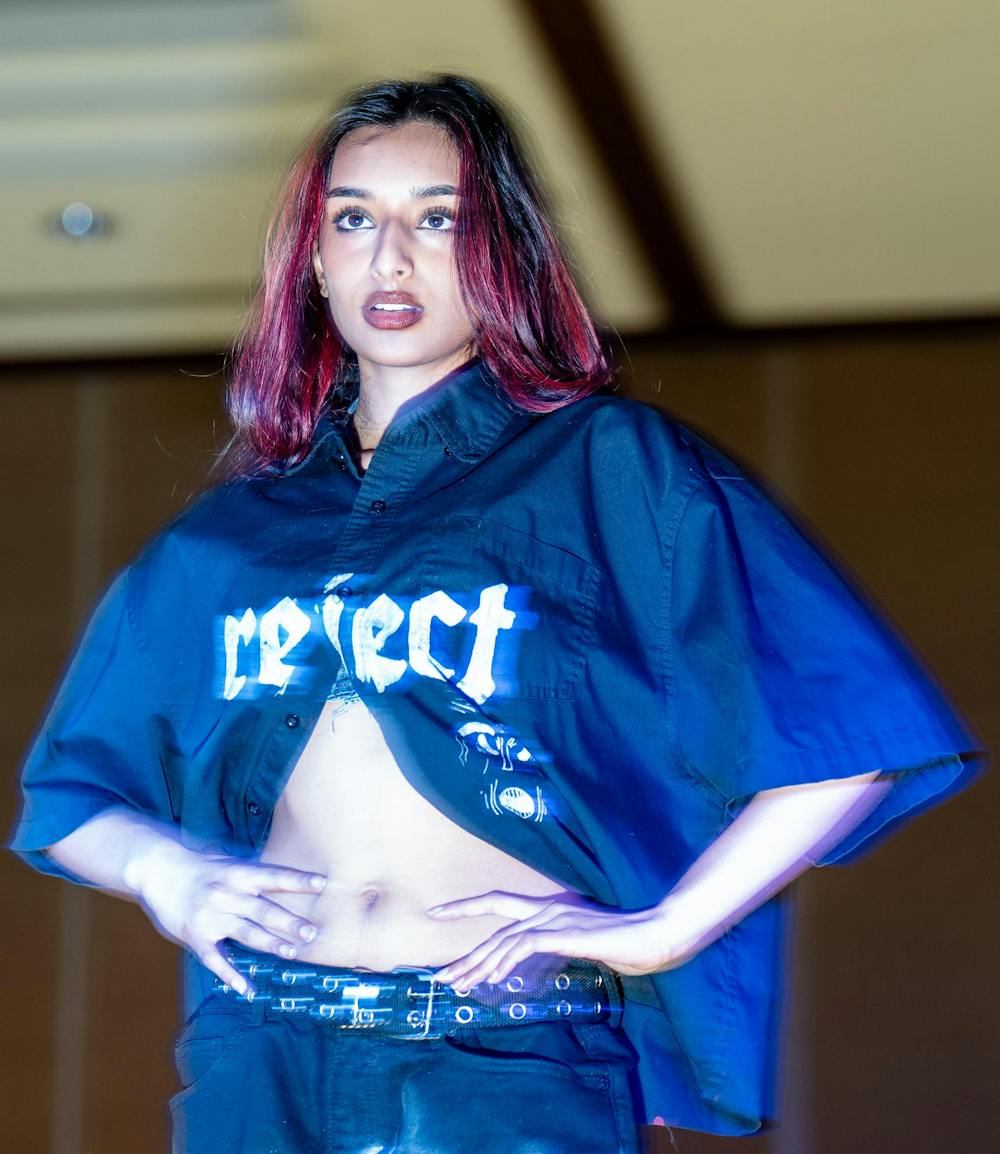 <p>Ashna Karikalan poses during N Crowd magazine’s fall fashion show at The Lansing Center on Dec. 8, 2024. N Crowd, a fashion magazine and non-profit organization for creatives at MSU, holds a fashion show every semester.</p>