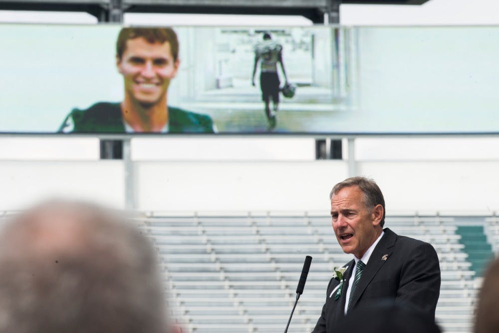 Head coach Mark Dantonio gives a speech during the celebration of life for former Michigan State punter Michael R. Sadler on July 31, 2016 at Spartan Stadium. Sadler and Nebraska punter Samuel N. Foltz were killed in a car accident on their way home from a kicking camp in Merton, Wisc.