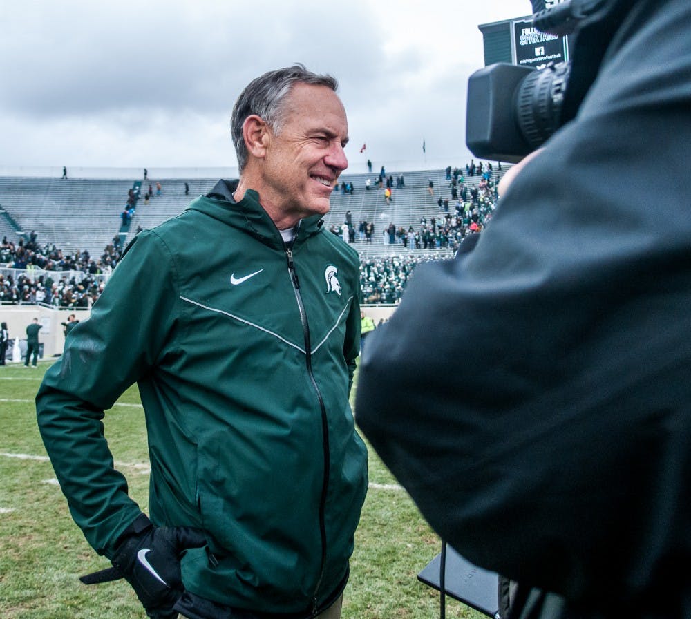 Head coach Mark Dantonio smiles while being interviewed after the game against Purdue on Oct. 27, 2018 at Spartan Stadium. The Spartans defeated the Boilermakers 23-13.