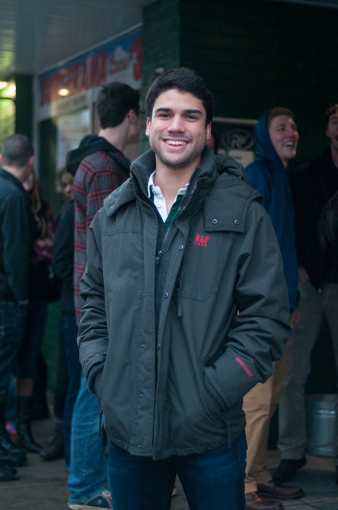 <p>Food industry management junior Diego Messina poses for portrait Jan. 22, 2015, outside The Riv, 231 M.A.C. Ave. Allyson Telgenhof/The State News.</p>