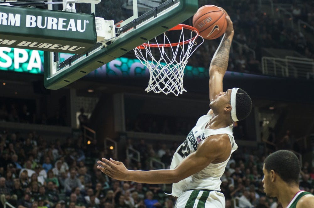 Freshman forward Miles Bridges (22) goes for dunk during the game against Mississippi Valley State on Nov. 18, 2016 at Breslin Center. The Spartans defeated the Delta Devils, 100-53.