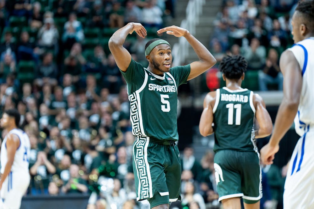 <p>Freshman guard Tre Holloman hypes up the crowd during the Spartans&#x27; 73-56 win over the Lakers on Nov. 1, 2022.</p>