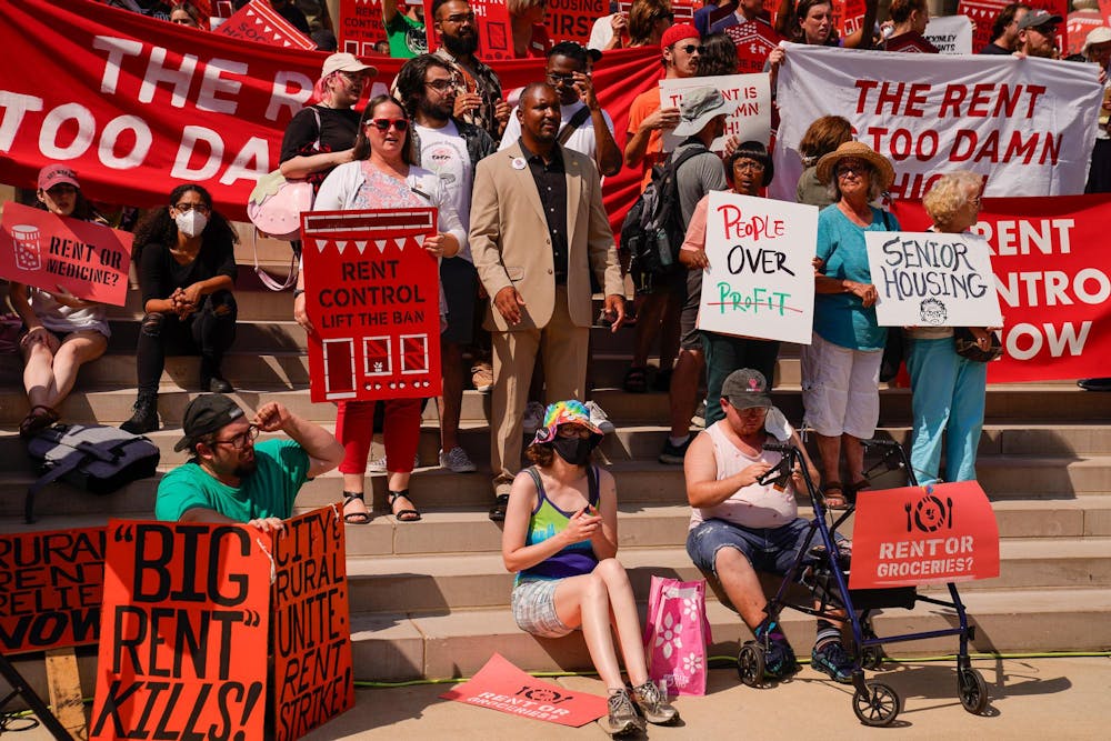 Members of the statewide coalition known as “Rent is Too Damn High” gathered at the Michigan State Capitol on Sept. 5, 2023. 