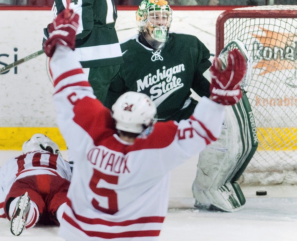 	<p>Freshman goaltender Jake Hildebrand reacts after allowing a goal Saturday, March 16, 2013, at Cady Arena of the Goggin Ice Center in Oxford, Ohio. <span class="caps">MSU</span> lost to Miami (Ohio) 4-1 in the second game of the second round of the <span class="caps">CCHA</span> playoffs. Danyelle Morrow/The State News</p>