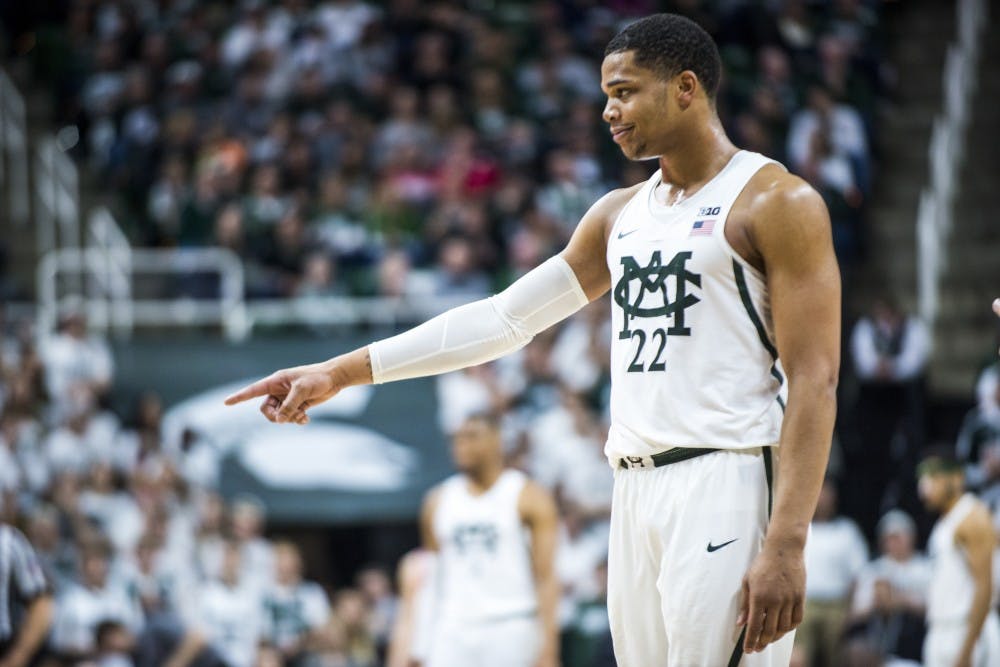 Freshman guard and forward Miles Bridges (22) gestures during the second half of the men's basketball game against the University of Wisconsin on Feb. 26, 2017 at Breslin Center. The Spartans defeated the Badgers, 84-74.