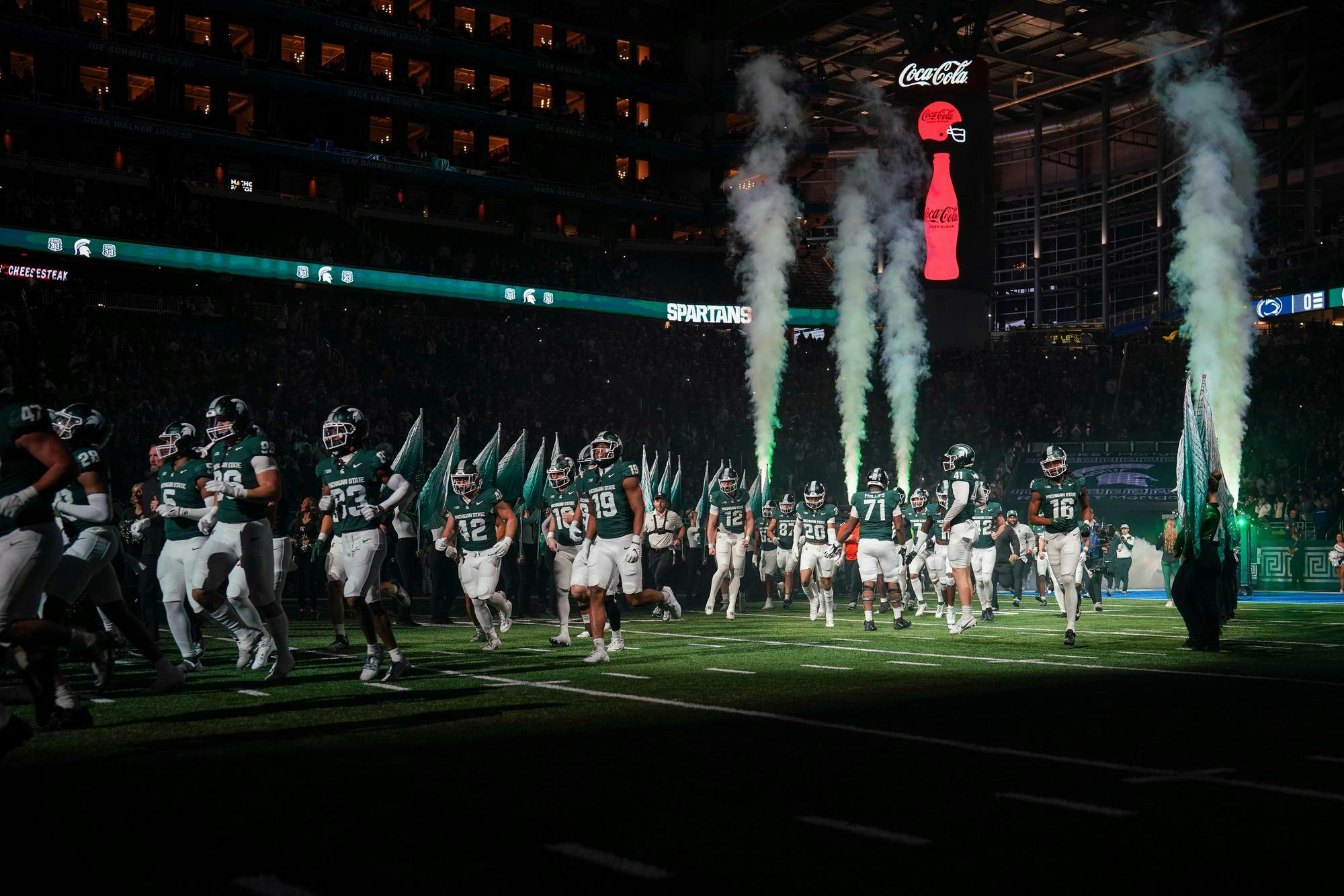 <p>Michigan State players walking onto the field before the game against Penn State at Ford Field on Nov. 24, 2023.</p>