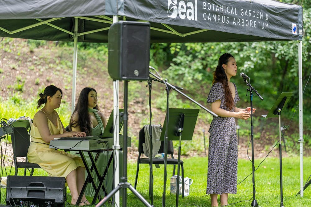 <p>The MSU Go Music Trio performs one of Zimo Chen's songs during the Music and the Garden event in East Lansing, Mich., on June 28, 2026.</p>