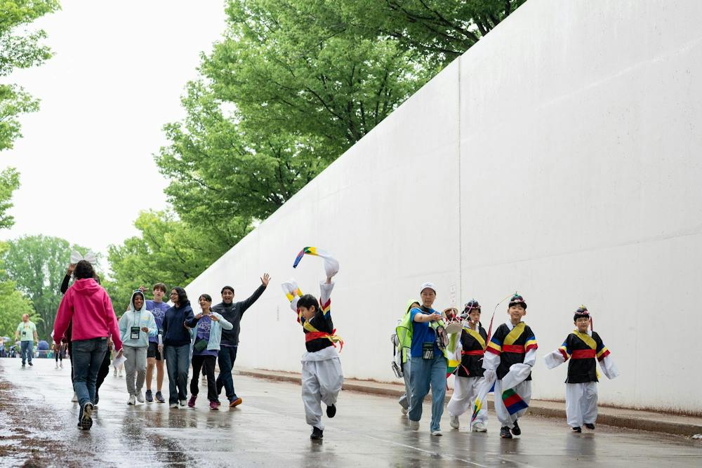 Students enter the 2025 Odyssey of the Minds opening ceremonies at the Jack Breslin Center in East Lansing, Michigan on May 21, 2025. 