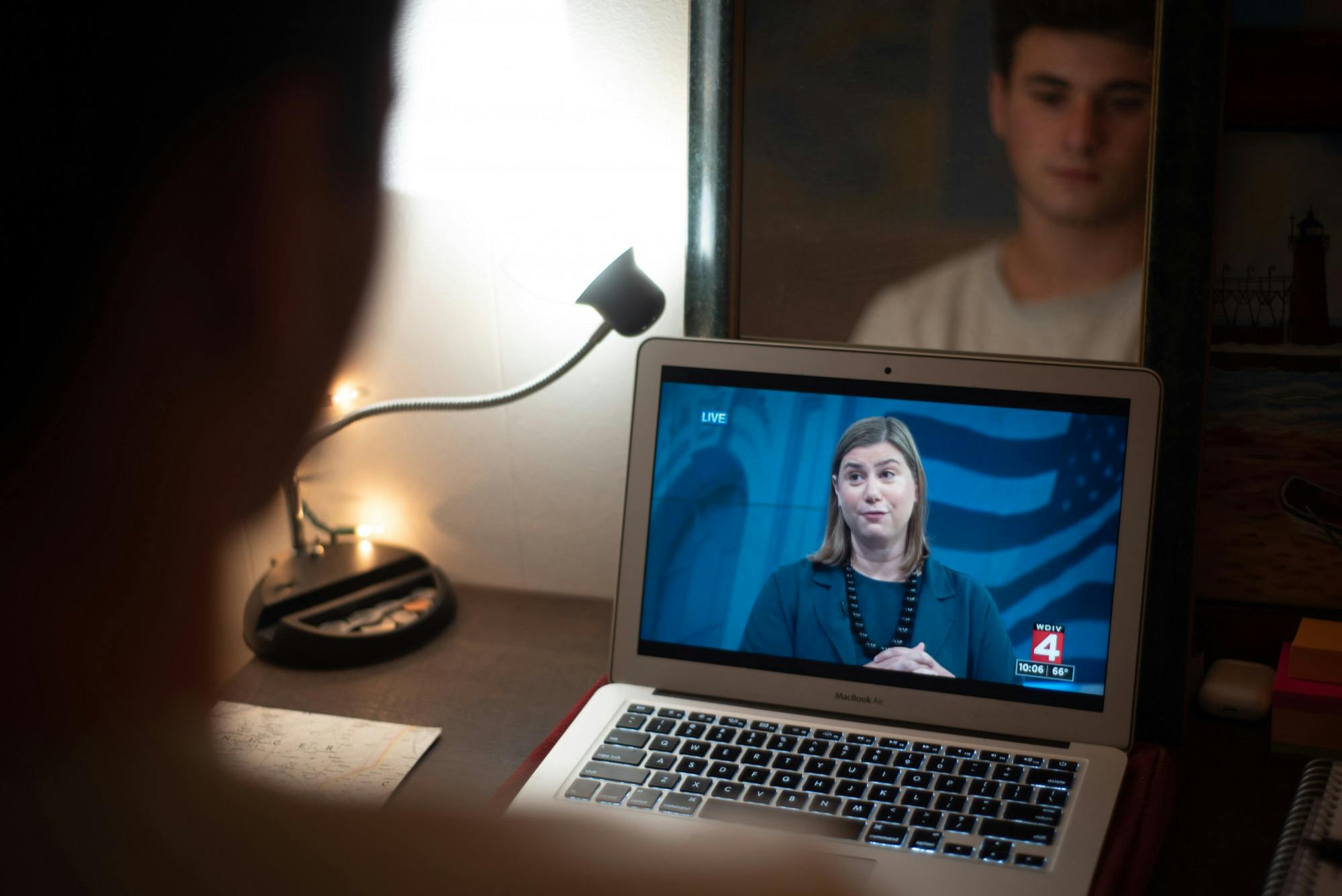 Michigan State University student Jackson Schooley watches Elissa Slotkin and Paul Junge debate on Wednesday, October 7, 2020. (Di'amond Moore)