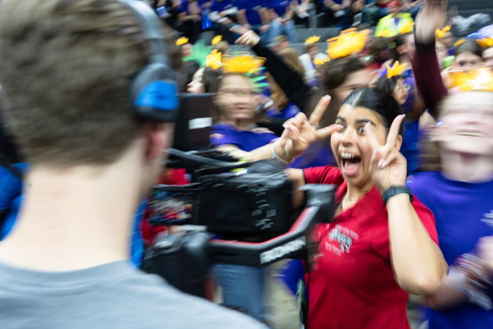 Odyssey of the Minds competitors attempt to get put on the Jack Breslin Center video screens during the opening ceremonies in East Lansing, Michigan on May 21, 2025. 