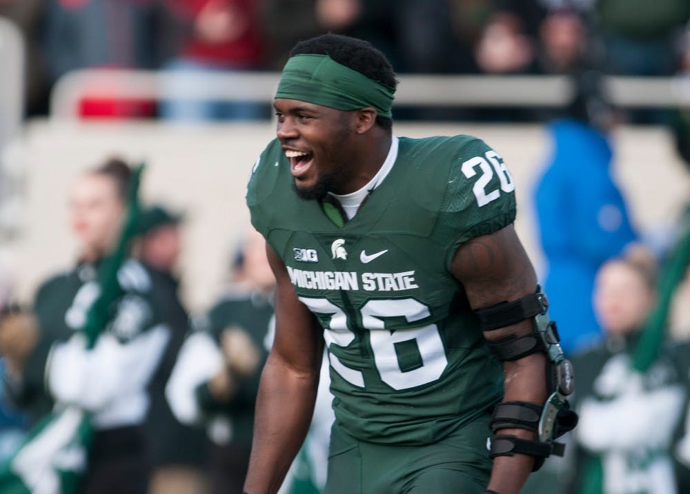 Senior safety RJ Williamson laughs  prior to the game against Penn State on Nov. 28, 2015 at Spartan Stadium. The seniors who will be graduating this year and their families were honored as this was the last home game of the season.