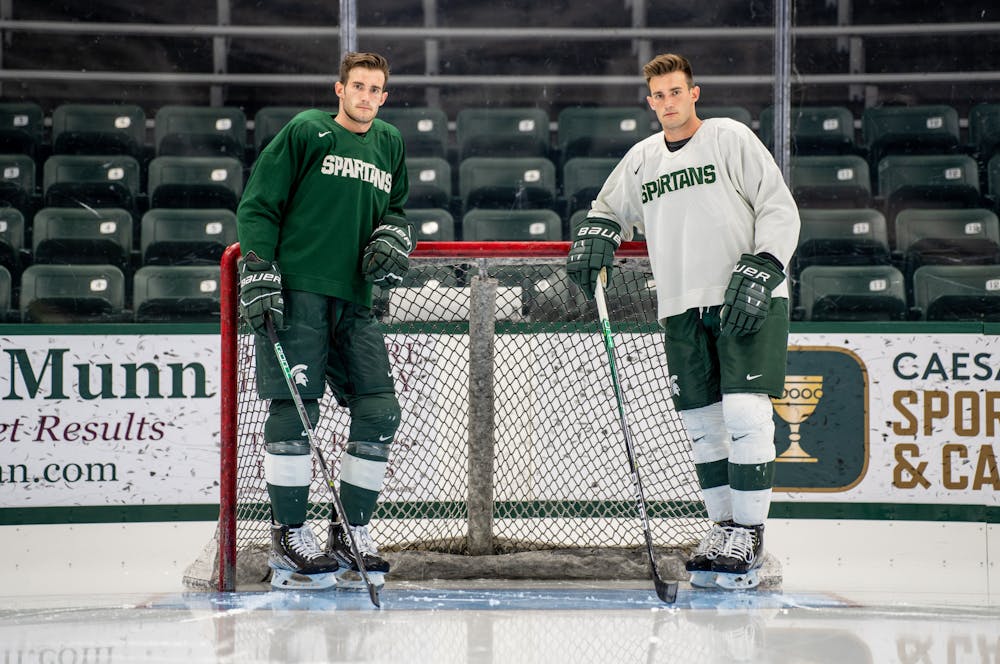 Cole and Christian Krygier pose on the ice at Munn Ice Arena on July 8, 2022.