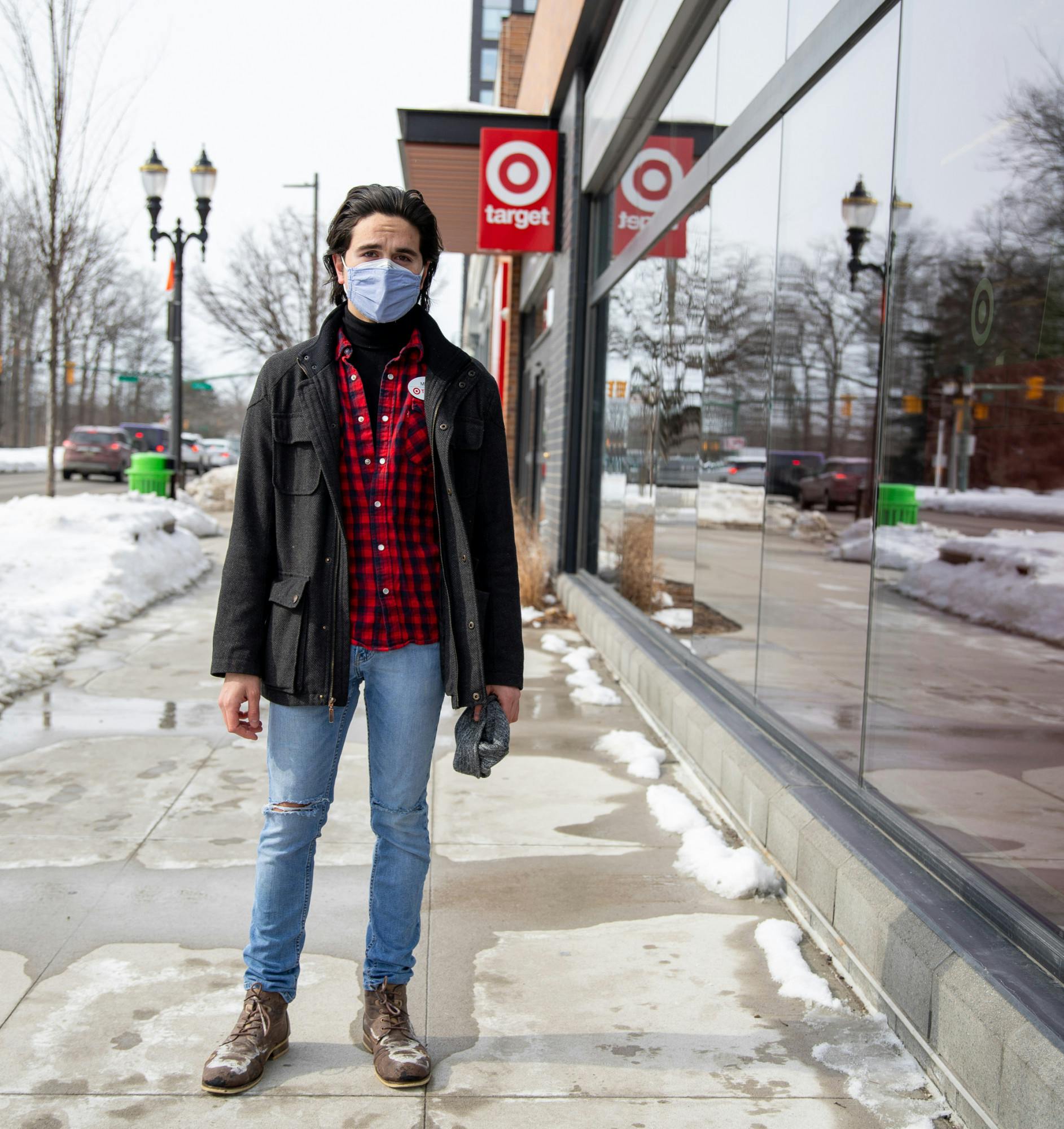 Feb. 21- East Lansing- Mitchell Page standing outside of the Target he works at on Grand River.