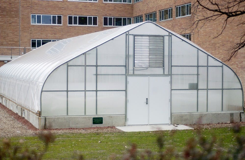 	<p>The recently completed Bailey hoop house stays closed up to preserve heat Nov. 26, 2012, outside of Bailey Hall. The hoop house will grow herbs and greens and allow students from the Residential Initiative on the Study of the Environment to get a hands-on learning experience. Michael Koury/The State News</p>