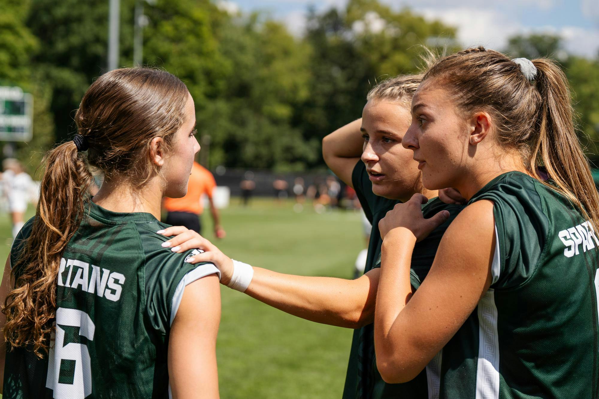 <p>Michigan State University women's soccer players communicate with one another on plays against Xavier University at DeMartin Soccer Stadium on Sept. 1, 2024.</p>