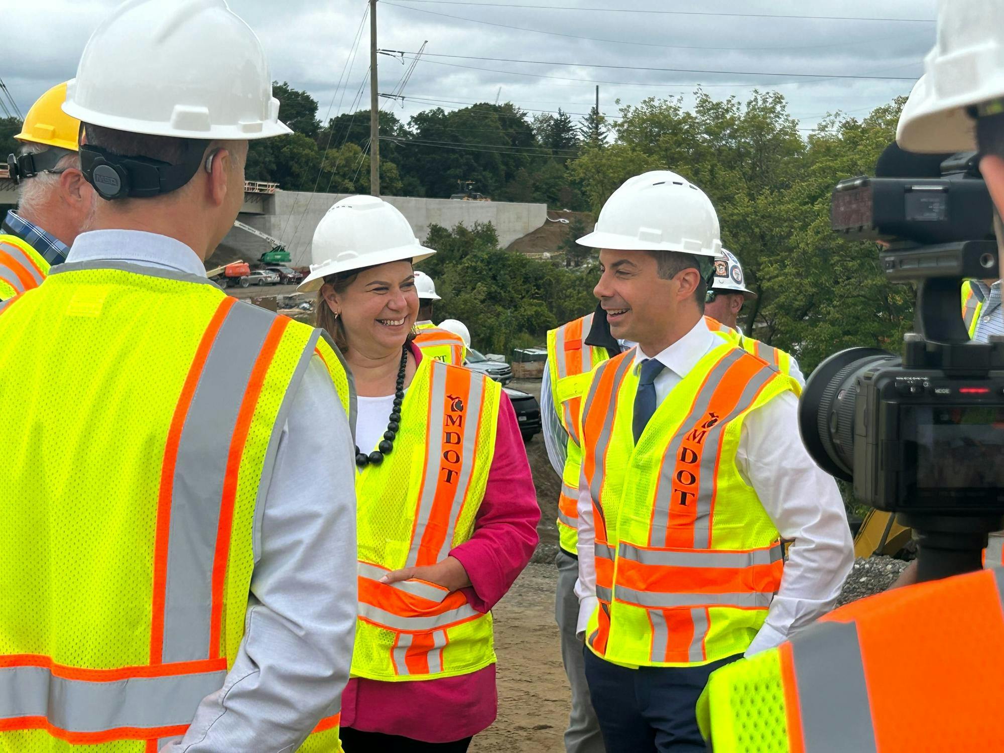 <p>Secretary of Transportation Pete Buttigieg and Rep. Elissa Slotkin meet with construction workers on Sept. 6, 2024. The two visited ongoing construction on US-127/I-496 as a part of the Biden administration's "Investing in America Tour."</p>