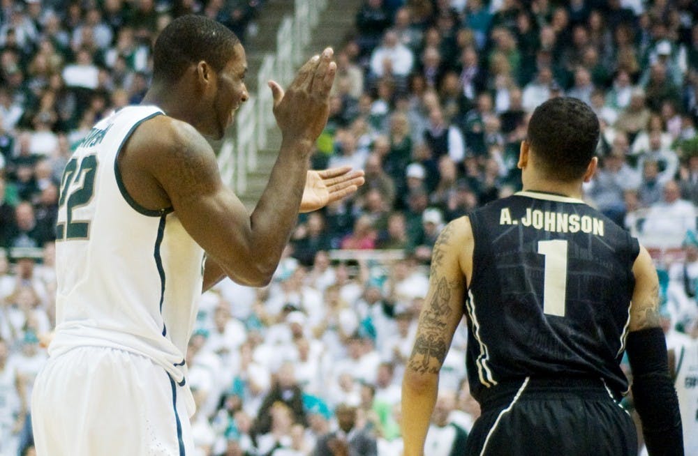 Making sure Boilermaker guard Anthony Johnson can hear him, freshman guard Brandan Dawson reacts after a call in the Spartans favor. The Spartans defeated the Boilermakers 83-58 Saturday afternoon at Breslin Center. Anthony Thibodeau/The State News