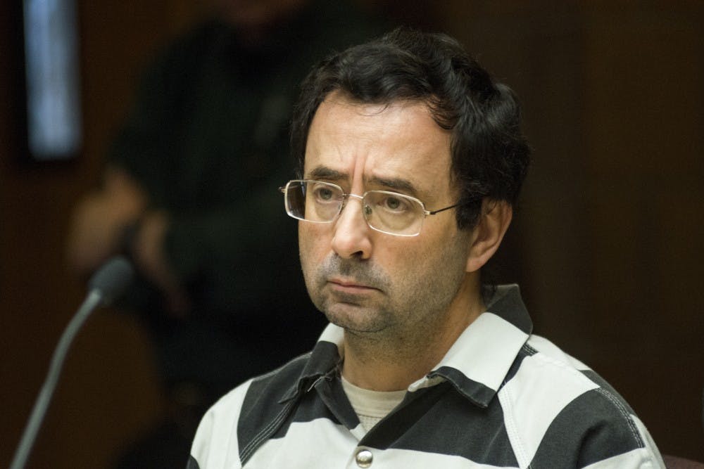 Former MSU employee Larry Nassar looks towards the  55th District Court Judge Donald L. Allen Jr. during the preliminary examination on Feb. 17, 2017 at 55th District Court in Mason, Mich. The preliminary examination occurred as a result of former MSU employee Larry Nassar's alleged sexual abuse.