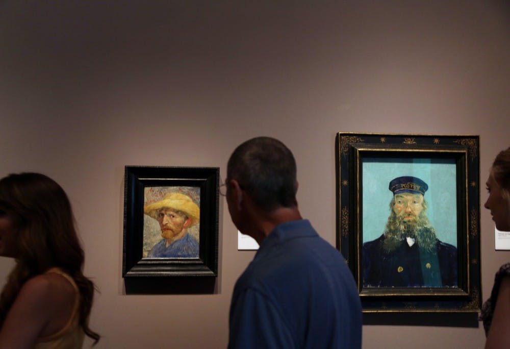	<p>Jaclyn Turner, from left, John Nickel and Michelle Weinert look at Vincent Van Gogh&#8217;s &#8220;Self Portrait,&#8221; 1887, at left and &#8220;Portrait of Postman Roulin,&#8221; 1888, at the Detroit Institute of Arts in Detroit, Michigan, May 30, 2013. Romain Blanquart/Detroit Free Press/MCT</p>