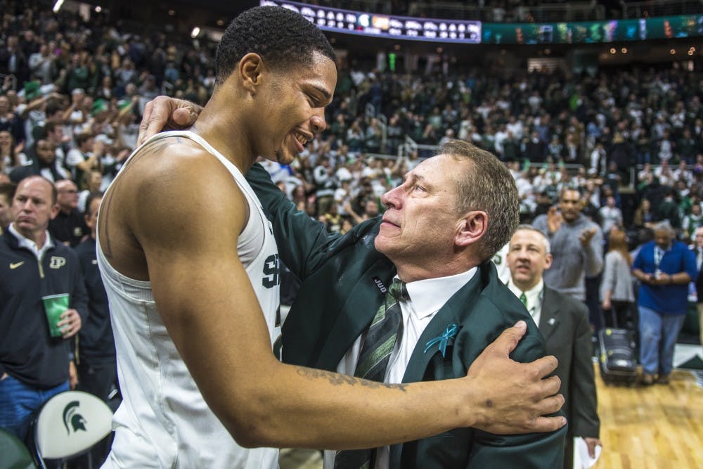 Sophomore guard Miles Bridges (22) embraces Michigan State’s head coach Tom Izzo after the men's basketball game against Purdue on Feb. 10, 2018 at Breslin Center. The Spartans defeated the Boilermakers, 68-65. (Nic Antaya | The State News)