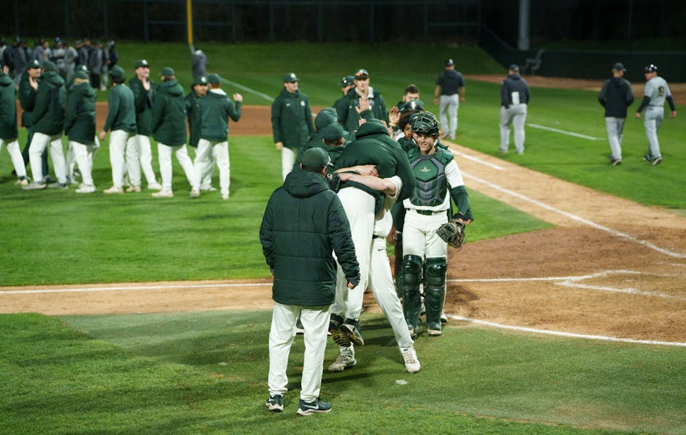 <p>Michigan State celebrates after their victory against Purdue Fort Wayne. Michigan State won 7-4 against Purdue Fort Wayne at the McLane Stadium, on Apr. 27, 2022.</p>