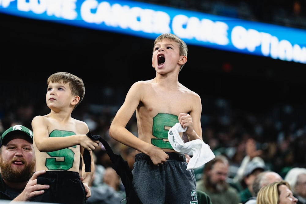 <p>A MSU fan screams from the stands at the Ford Field Stadium in Detroit, MI on Nov. 29, 2025.</p>