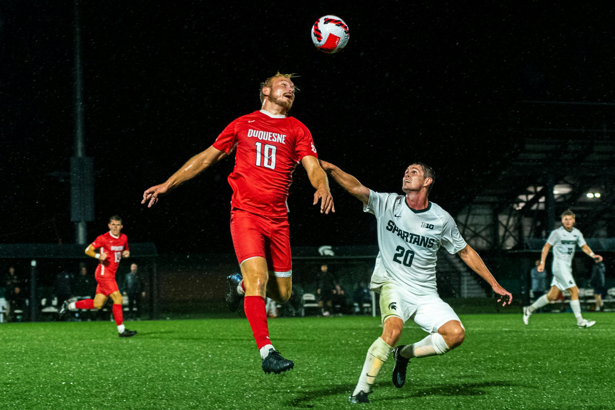 <p>Duquesne freshman forward Joey Belloti intercepts the ball with a header. Michigan State men&#x27;s soccer team defeated Duquesne 1-0 on Sept. 21, 2021 in East Lansing.</p>
