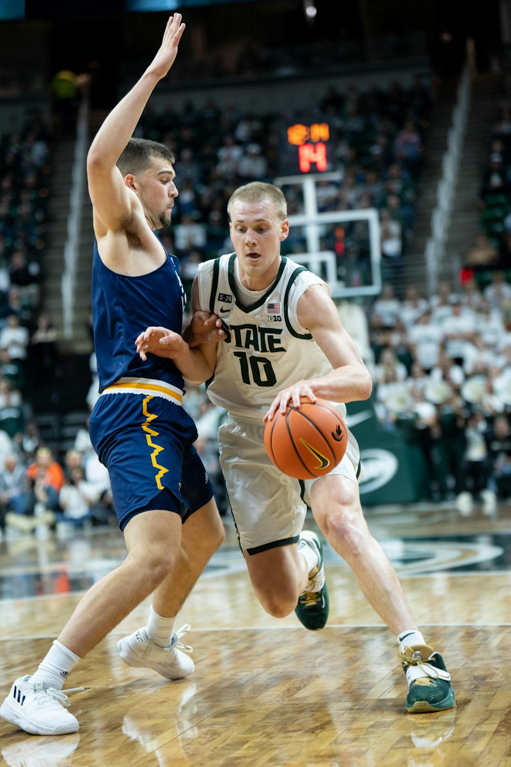 <p>Graduate student forward Joey Hauser pushes his way into the lane during the Spartans' 73-55 win over Northern Arizona on Nov. 7, 2022.</p>