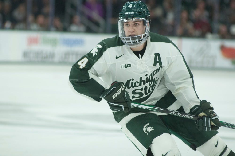 Senior defense Travis Walsh waits for a pass during a hockey game against Ohio State on March 12, 2016 at Munn Ice Arena. The Spartans defeated the Buckeyes in a shootout, 1-1. 