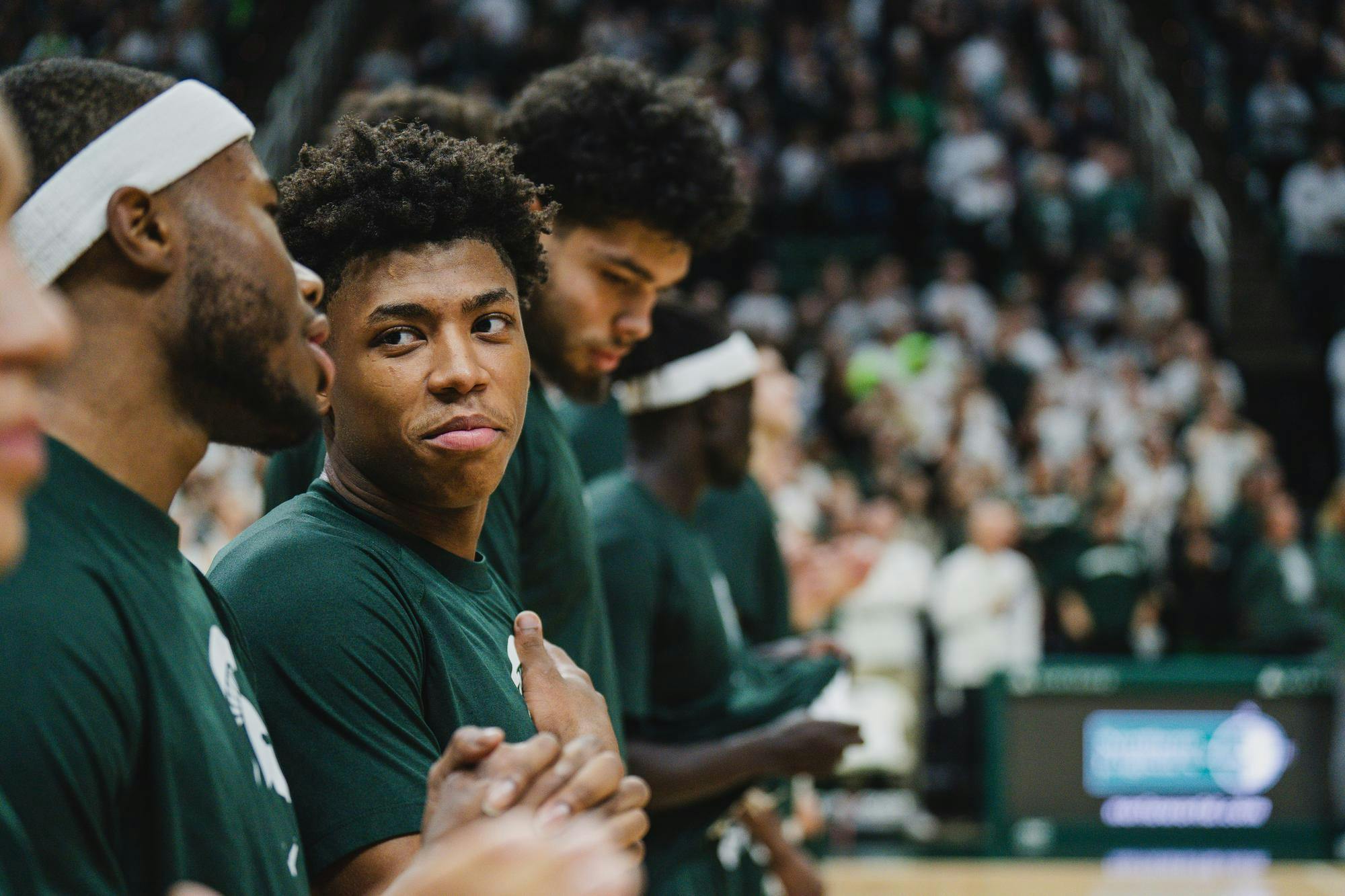 <p>MSU sophomore guard Jeremy Fears Jr. (1) looks at junior teammate Tre Holloman (5) during the national anthem, as MSU takes on Bowling Green at the Breslin center on Nov. 16, 2024</p>