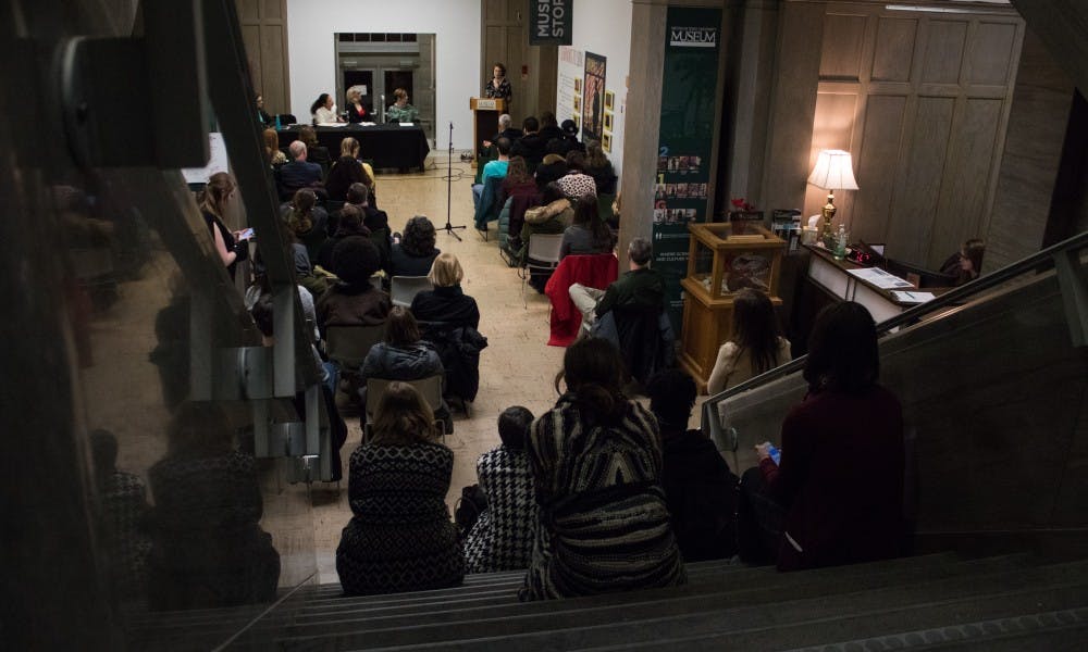 Attendees listen to panelists speak at the Sister Survivors Speak event at the MSU Museum on Jan. 15, 2019.