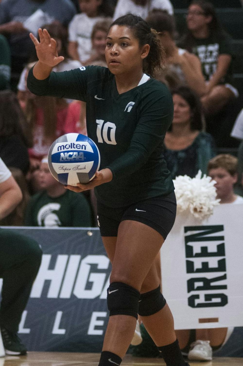 Junior libero Abby Monson (10) gets ready to serve the volleyball during the volleyball game against Notre Dame on Sept. 16, 2016 at the Jenison Field House. The Spartans defeated the Fighting Irish, 3-0. 