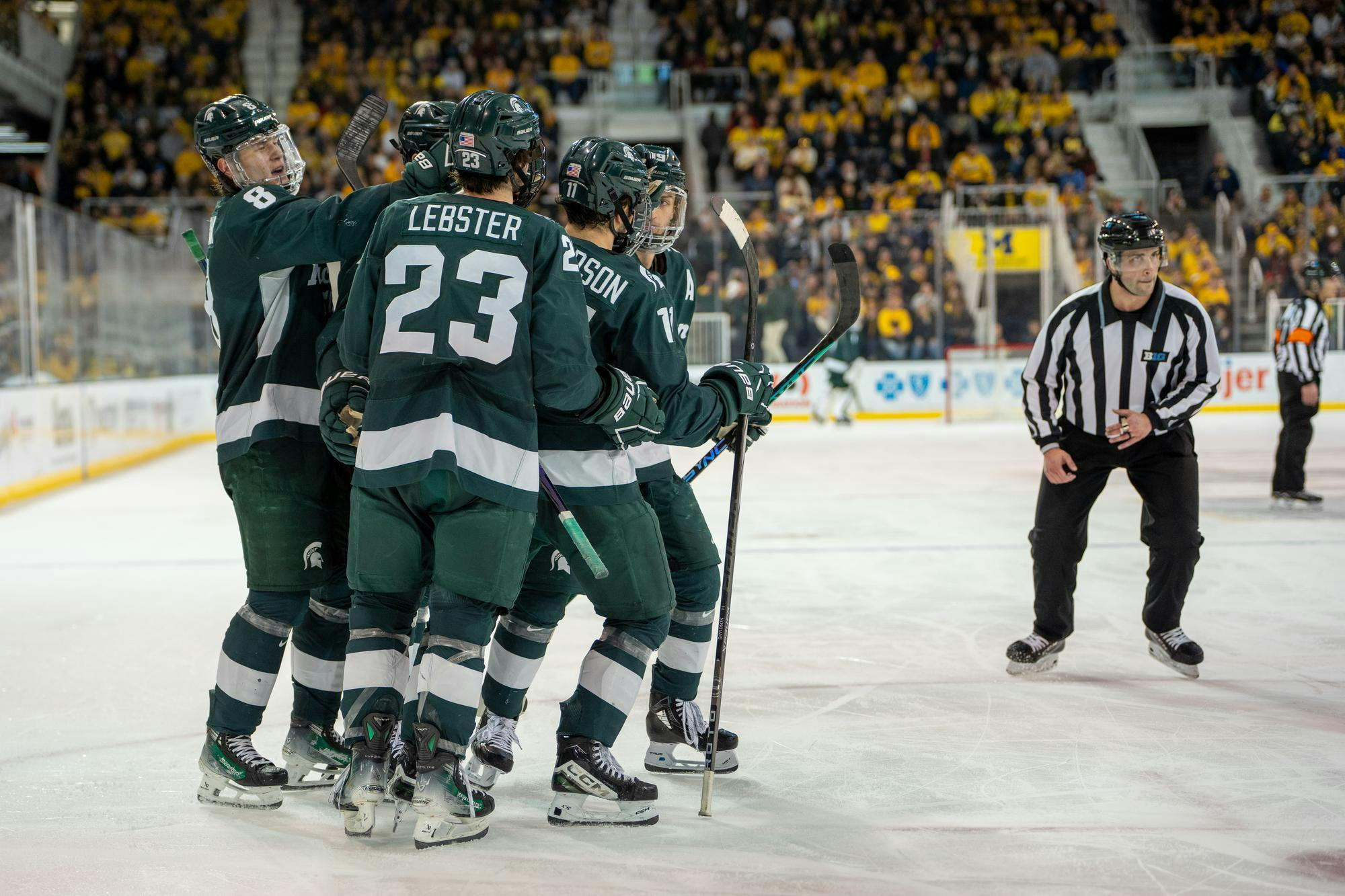 <p>The Spartans celebrating a goal together during a game against University of Michigan at Yost Ice Arena on Jan. 20, 2024. Michigan State pulled off an impressive comeback win to beat the Wolverines 7-5.</p>