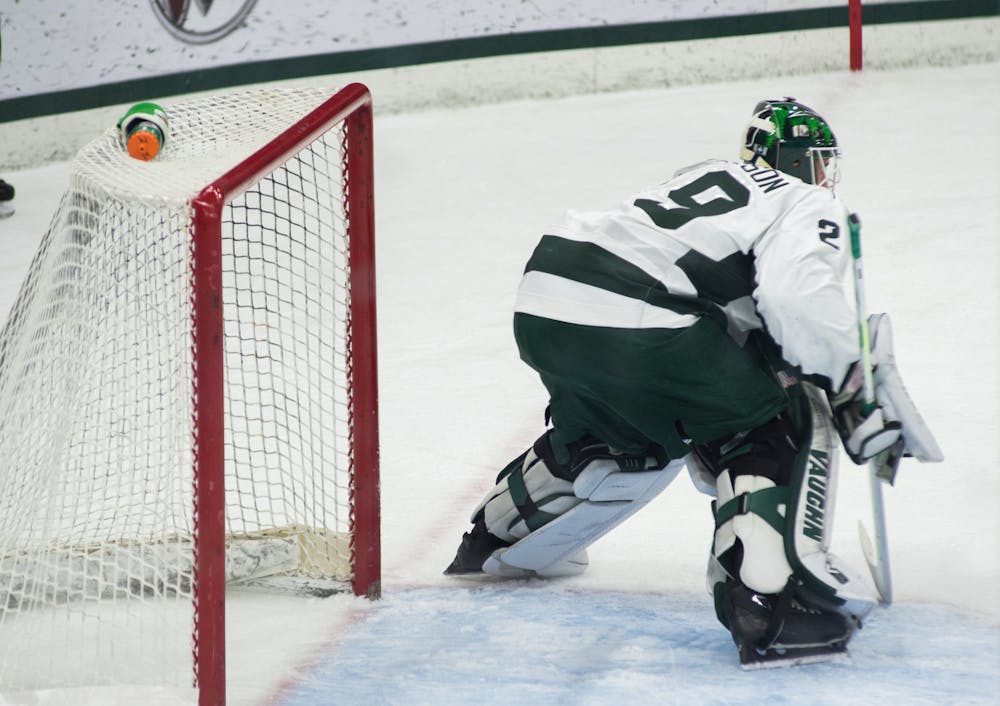 <p>The Spartan&#x27;s goalie Pierce Charleson (29) prepares to defend the goal in the Spartans&#x27; loss against Notre Dame on Feb. 26, 2021.</p>