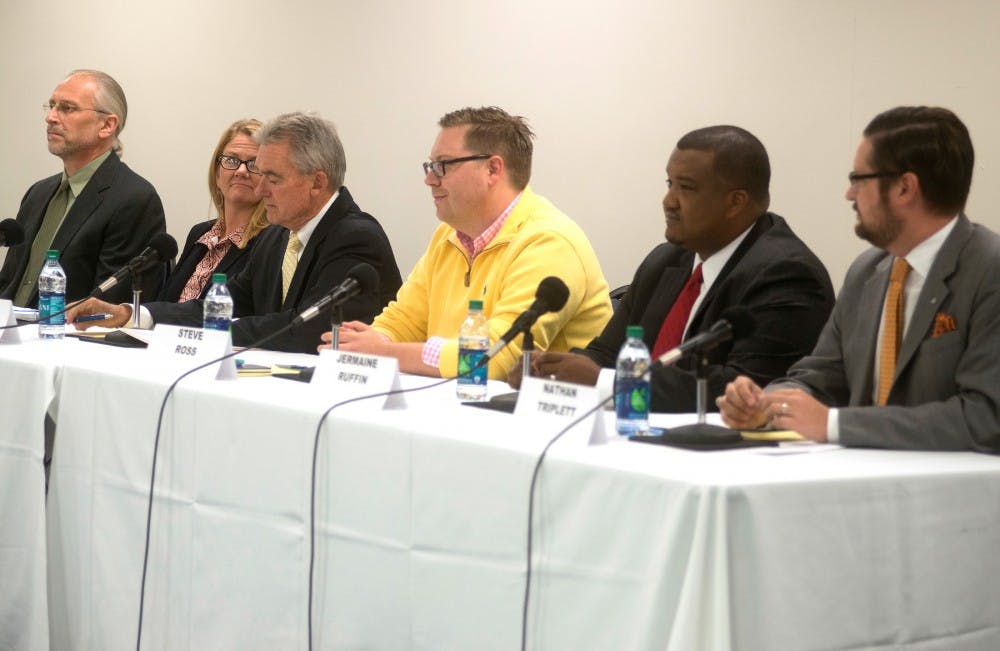 <p>City council candidates answer questions for an audience on Sept. 30, 2015 during a public forum at the Hannah Community Center, 819 Abbot Road, in East Lansing. The forum, hosted by the League of Women Voters of the Lansing Area, consisted of candidates answering questions posed by audience members.</p>