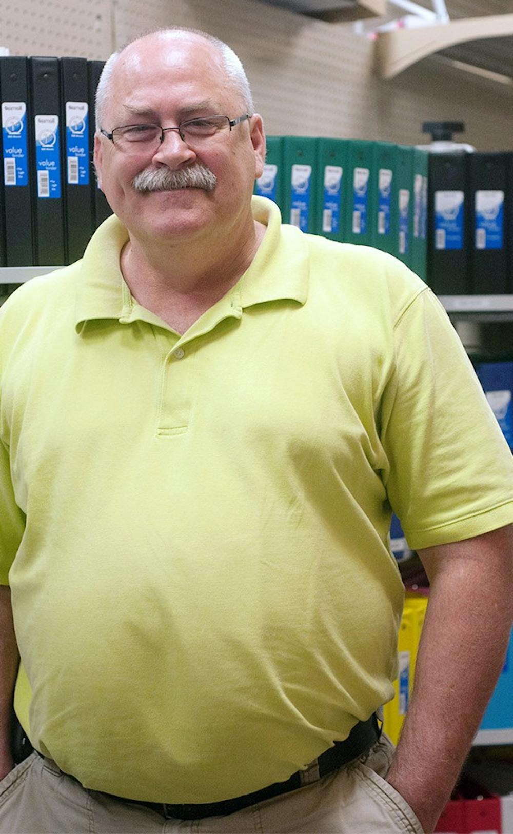 <p>Student Book Store manager Jim Page of East Lansing poses for a portrait. Asha Johnson/The State News</p>