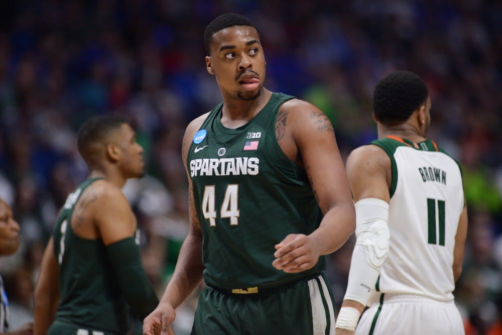 Freshman forward Nick Ward (44) express emotion the first half of the game against University of Miami (Fla.) in the first round of the Men's NCAA Tournament on March 17, 2017 at  at the BOK Center in Tulsa, Okla.The Spartans defeated  the Hurricanes, 78-58.