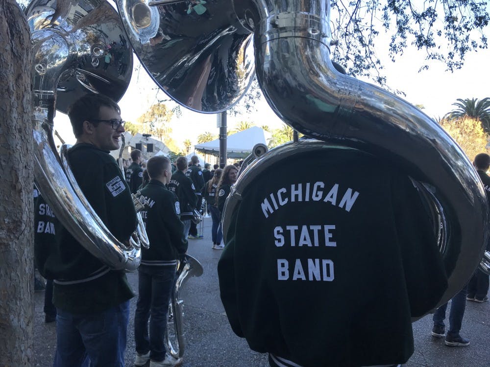 Spartan band members gather in Justin Herman Plaza in San Francisco on Dec. 30, 2018 to perform during the official Redbox Bowl pep rally. The Spartans will take on the Oregon Ducks on Dec. 31 in the Redbox Bowl. 