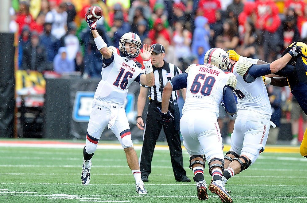 <p>Maryland quarterback C.J. Brown passes the ball Sept. 13, 2014, during a game against West Virginia. Photo courtesy of University of Maryland Athletics</p>