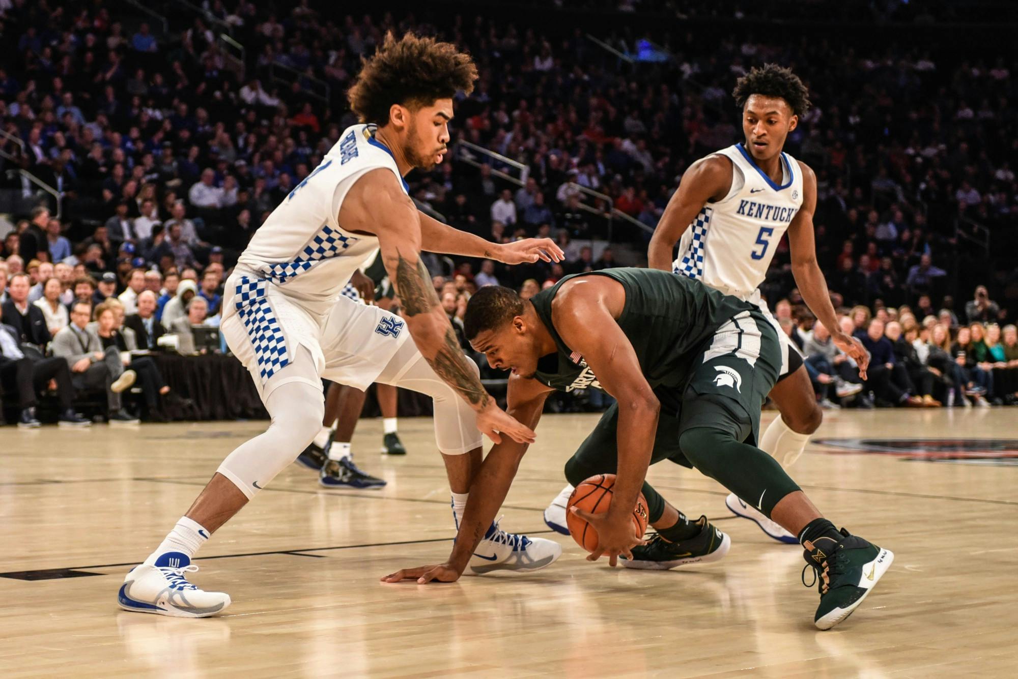 Junior forward Xavier Tillman (23) moves for the ball during the game against Kentucky at the State Farm Champions Classic at Madison Square Garden on Nov. 5, 2019. The Spartans fell to the Wildcats, 69-62.