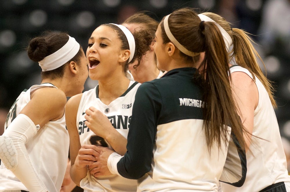<p>Senior guard Klarissa Bell celebrates after the Spartans won the game against Michigan on March 7, 2014, at Bankers Life Fieldhouse in Indianapolis. The Spartans beat the Wolverines, 61-58, to advance to the third round of the Big Ten Tournament. Betsy Agosta/The State News</p>