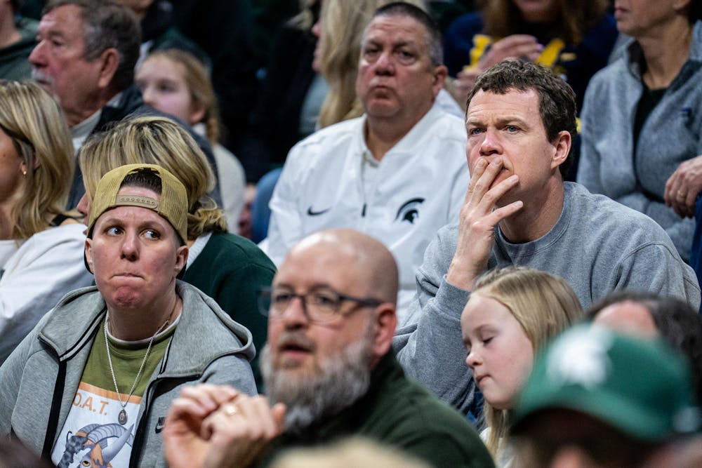 Michigan State Spartans fan reacts to overtime during the women’s rivalry matchup at the Breslin Student Events Center in East Lansing, Mich., on Sunday, Feb. 1, 2026.