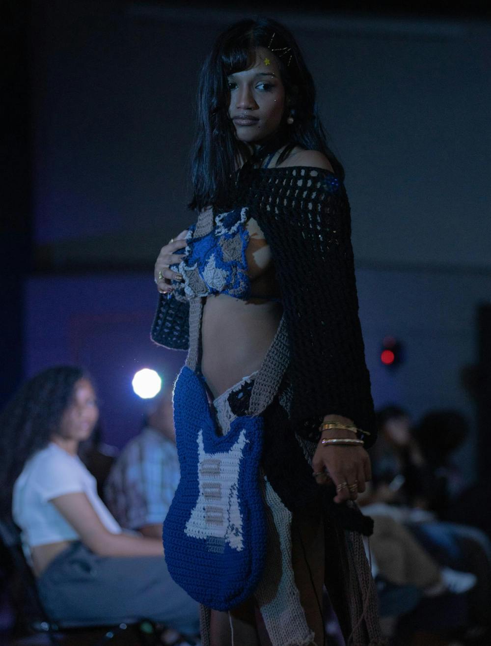 <p>A model pose in a set designed by Vincitcia, a Michigan based crochet couture brand.</p>