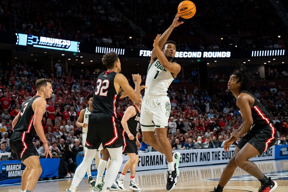 <p>Freshman guard Pierre Brooks (1) passes the ball during Michigan State&#x27;s win over the Davidson Wildcats on March 18, 2022.</p>