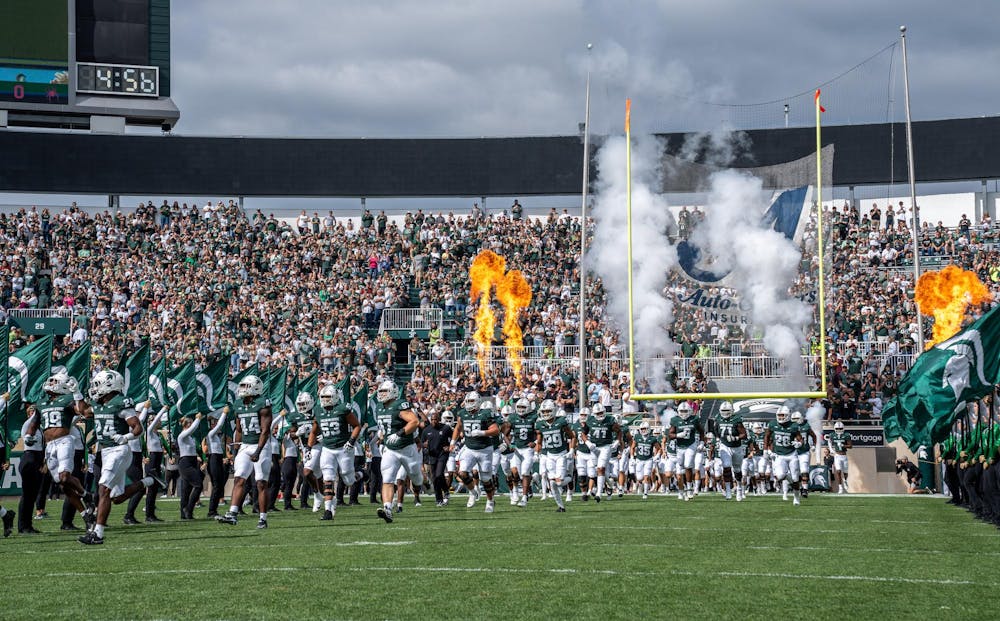 <p>The MSU football team runs onto the field before the start of the game against Richmond at Spartan Stadium on Sept. 9, 2023. The Spartans ultimately defeated the Spiders 45-14.</p>