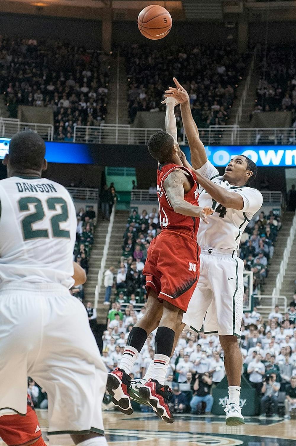	<p>Freshman guard Gary Harris shoots as Nebraska guard Ray Gallegos defends on Jan. 13, 2013 at the Breslin Center. The Spartans defeated the Huskers 66-56. Julia Nagy/The State News</p>