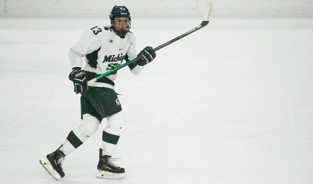 <p>Senior left wing Brennan Sanford (13) skates during the game against Ohio State University at Munn Ice Arena Jan. 5, 2019. The Spartans fell to the Buckeyes, 6-0.</p>